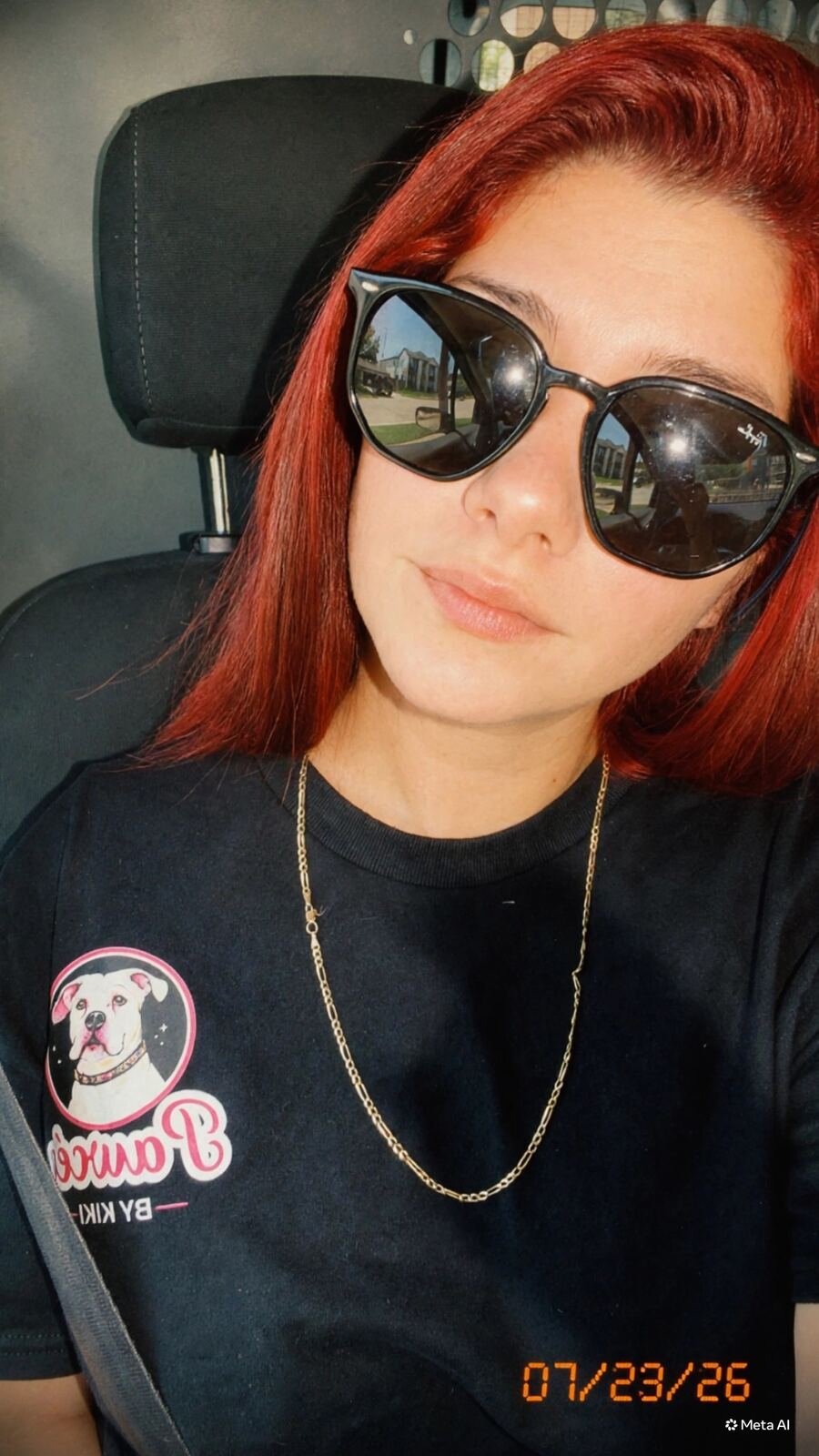 Kiara, owner of Pawcéa by Kiki, with a dog in her care